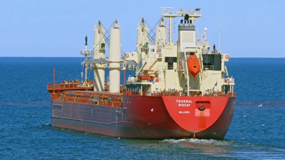 Red and white commercial cargo carrier, the Federal Biscay